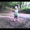 Ada tosses rocks into Adobe Creek