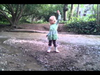 Ada tosses rocks into Adobe Creek